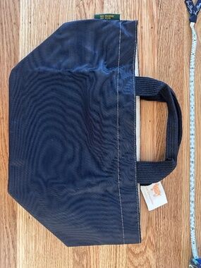 New with tags Hervé Chapelier Paris nylon tote in classic black/tan.